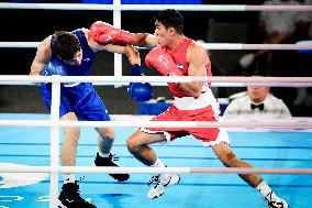 Paris 2024 - Boxing 71kg - Asadkhuja Muydinkhujaev Wins Gold