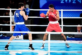 Paris 2024 - Boxing 71kg - Asadkhuja Muydinkhujaev Wins Gold