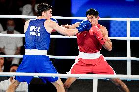 Paris 2024 - Boxing 71kg - Asadkhuja Muydinkhujaev Wins Gold