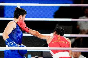 Paris 2024 - Boxing 71kg - Asadkhuja Muydinkhujaev Wins Gold