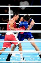 Paris 2024 - Boxing 71kg - Asadkhuja Muydinkhujaev Wins Gold