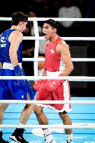 Paris 2024 - Boxing 71kg - Asadkhuja Muydinkhujaev Wins Gold