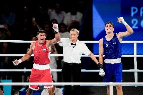 Paris 2024 - Boxing 71kg - Asadkhuja Muydinkhujaev Wins Gold