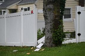 Severe Weather Causes Tree To Damage Home And A Fence With Power Lines Destroyed In Hillsdale New Jersey