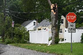 Severe Weather Causes Tree To Damage Home And A Fence With Power Lines Destroyed In Hillsdale New Jersey