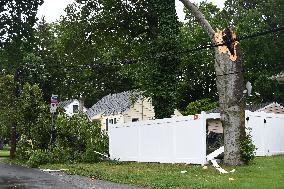 Severe Weather Causes Tree To Damage Home And A Fence With Power Lines Destroyed In Hillsdale New Jersey