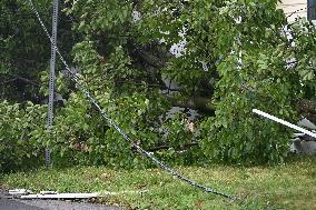 Severe Weather Causes Tree To Damage Home And A Fence With Power Lines Destroyed In Hillsdale New Jersey