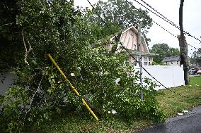 Severe Weather Causes Tree To Damage Home And A Fence With Power Lines Destroyed In Hillsdale New Jersey