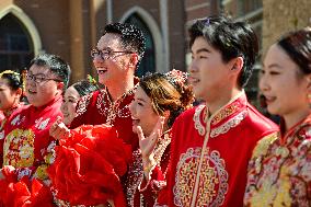 CHINA-XINJIANG-URUMQI-QIXI FESTIVAL-GROUP WEDDING (CN)