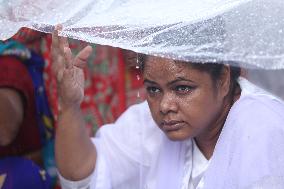 Nepali Human Rights Activists Defy Rains And Continue Protests In Kathmandu