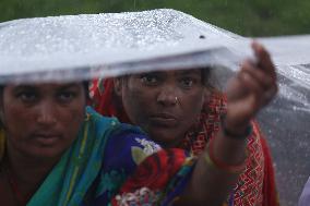 Nepali Human Rights Activists Defy Rains And Continue Protests In Kathmandu