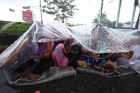 Nepali Human Rights Activists Defy Rains And Continue Protests In Kathmandu