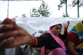 Nepali Human Rights Activists Defy Rains And Continue Protests In Kathmandu