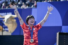 Paris 2024 - Fans salute medalists at the Parc des Champions in Paris FA