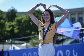 Paris 2024 - Fans salute medalists at the Parc des Champions in Paris FA