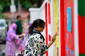 Students Paint The New Graffitis In Dhaka