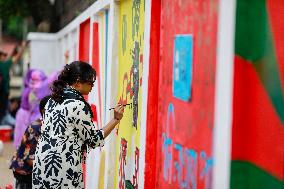 Students Paint The New Graffitis In Dhaka