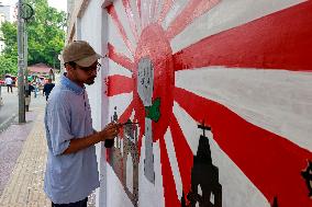 Students Paint The New Graffitis In Dhaka