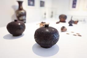 HainanOutlook | Inheritor of coconut shell carving in Hainan dedicates to the innovation and promotion of the art