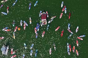 Paddle Boarders Attending A Water Sport Activity - China