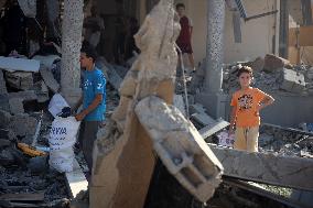 Gazans Search Through Rubble Following Strike