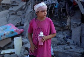 Gazans Search Through Rubble Following Strike