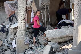 Gazans Search Through Rubble Following Strike