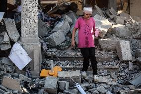 Gazans Search Through Rubble Following Strike