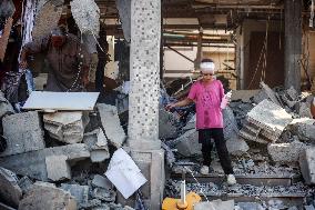 Gazans Search Through Rubble Following Strike