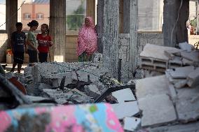 Gazans Search Through Rubble Following Strike