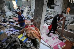 Gazans Search Through Rubble Following Strike