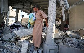 Gazans Search Through Rubble Following Strike