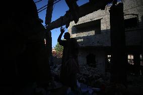 Gazans Search Through Rubble Following Strike