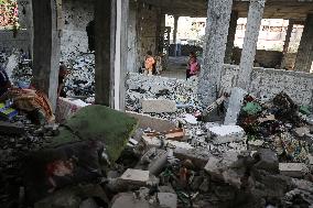 Gazans Search Through Rubble Following Strike