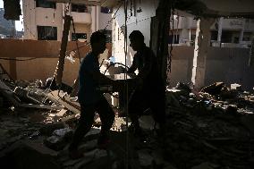 Gazans Search Through Rubble Following Strike