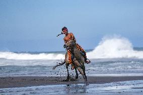 Horse Riders Perform At The Komune Beach In Bali