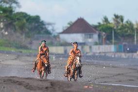 Horse Riders Perform At The Komune Beach In Bali