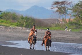 Horse Riders Perform At The Komune Beach In Bali