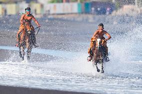 Horse Riders Perform At The Komune Beach In Bali