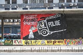 Students Are Painting Graffiti On A Wall Alongside A Road In Dhaka.