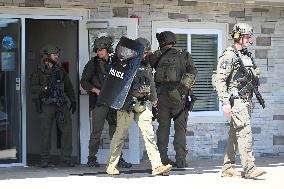 Raid At WoodSpring Suites Hotel In Carol Stream Illinois