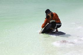 Tourists Visit Qarhan Salt Lake in Haixi