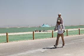 Tourists Visit Qarhan Salt Lake in Haixi