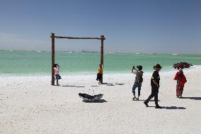 Tourists Visit Qarhan Salt Lake in Haixi