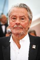 Cannes - Alain Delon Walks The Red Carpet