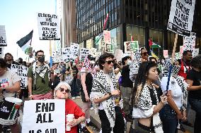 Protesters Demonstrate On The March Of The Eve Of The Democratic National Convention In Chicago Illinois