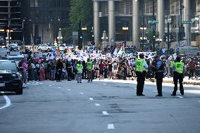 Protesters Demonstrate On The March Of The Eve Of The Democratic National Convention In Chicago Illinois