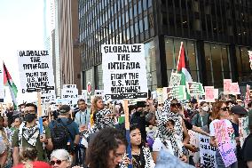 Protesters Demonstrate On The March Of The Eve Of The Democratic National Convention In Chicago Illinois