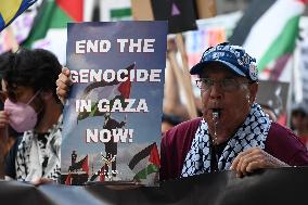 Protesters Demonstrate On The March Of The Eve Of The Democratic National Convention In Chicago Illinois