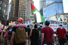 Protesters Demonstrate On The March Of The Eve Of The Democratic National Convention In Chicago Illinois